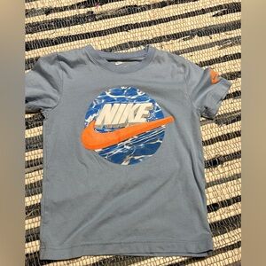 Nike Kids Sky Blue Tee with Vibrant Orange Swoosh